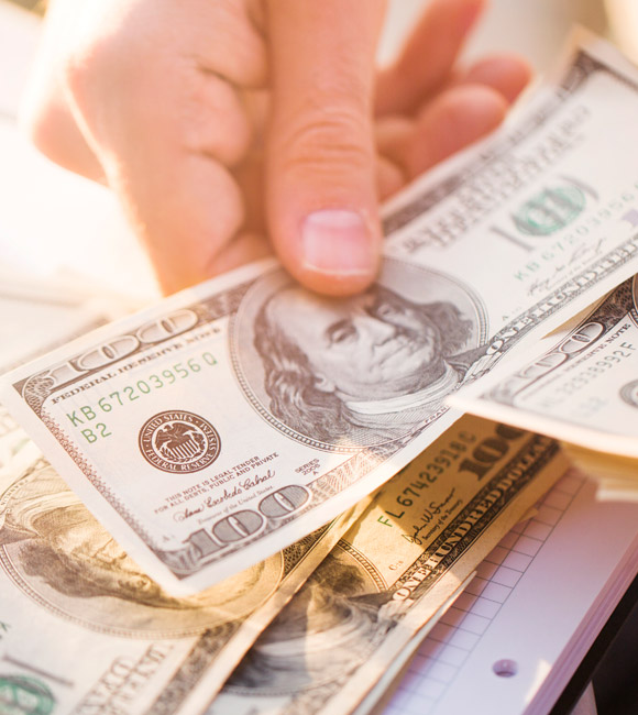 hand holding money